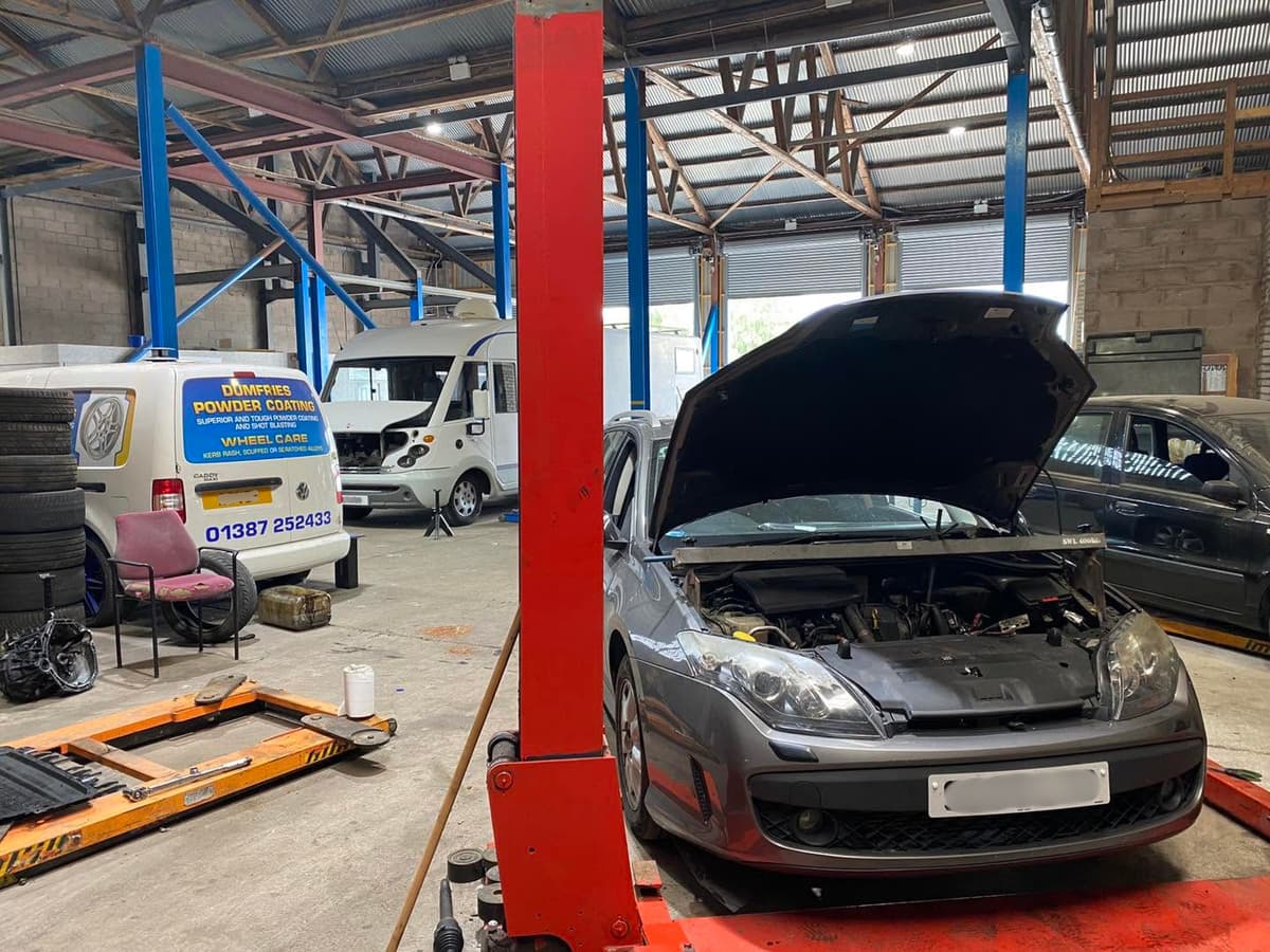 Mechanic working on a car